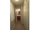 Hallway that provides access to the bathroom and includes a storage closet at 5512 Arrowhead Dr, Acworth, GA 30102