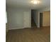 Open living room has wood floors, neutral walls, and a staircase to upper level at 5512 Arrowhead Dr, Acworth, GA 30102