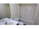 Bathroom featuring a bathtub, toilet, and sink with a mirror and modern fixtures at 6572 Chestnut Oaks Rdg, Lithonia, GA 30038