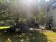 Outdoor patio area with furniture, perfect for entertaining and relaxation in backyard at 975 Willeo Rd, Roswell, GA 30075