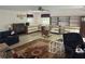 Spacious living room with built-in shelves and storage at 975 Willeo Rd, Roswell, GA 30075