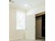 Bedroom featuring a window and walk-in closet with built-ins at 1505 Walker Ave, College Park, GA 30337