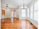 Hardwood floors in the dining and living area with access to a patio at 1505 Walker Ave, College Park, GA 30337