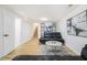 Finished basement area with modern furniture, light hardwood flooring, and natural light at 3388 Hyland Dr, Decatur, GA 30032