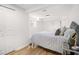 Bedroom featuring hardwood floors, neutral colors, and a side table at 3388 Hyland Dr, Decatur, GA 30032