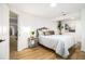 Bedroom with a comfortable bed, wood floors, and tasteful decor at 3388 Hyland Dr, Decatur, GA 30032