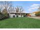 Single-story home with mature trees, manicured lawn, and inviting curb appeal at 3388 Hyland Dr, Decatur, GA 30032