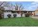 Charming single-story home with a well-manicured lawn and covered carport at 3388 Hyland Dr, Decatur, GA 30032