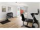 Home gym featuring wood floors, gym equipment, and french doors at 3388 Hyland Dr, Decatur, GA 30032
