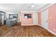 Bright open-concept living area with hardwood floors seamlessly flowing into the modern kitchen at 1035 Stonewall Se Dr, Atlanta, GA 30315