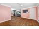 Bright open-concept living area with hardwood floors seamlessly flowing into the modern kitchen at 1035 Stonewall Se Dr, Atlanta, GA 30315
