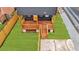 Aerial view of a home with well maintained yard, wood columns, railings and covered porch at 701 Smith St, Atlanta, GA 30310