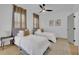 Bright bedroom with two beds, ceiling fan, and modern decor for a comfortable stay at 701 Smith St, Atlanta, GA 30310