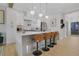 Modern kitchen with center island, stainless steel appliances, and bar stool seating at 701 Smith St, Atlanta, GA 30310