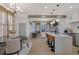 Open-concept living space with a kitchen island, dining area, and a cozy living room at 701 Smith St, Atlanta, GA 30310
