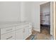 Modern bathroom with sleek vanity, awaiting final touches, offering style and functionality at 141 N. Trace, Alpharetta, GA 30009