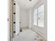Bright bathroom with large window, allowing natural light and creating a serene space at 141 N. Trace, Alpharetta, GA 30009