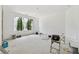 A bright, expansive bedroom featuring a large picture window, ready for finishing touches at 141 N. Trace, Alpharetta, GA 30009