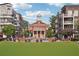 Town square with water feature surrounded by shops and restaurants at 141 N. Trace, Alpharetta, GA 30009