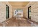 Arched entryway with brick columns and cedar ceiling, a perfect option for outdoor entertaining at 141 N. Trace, Alpharetta, GA 30009