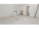 Hallway featuring multiple doorways, showcasing open-concept design and functionality at 141 N. Trace, Alpharetta, GA 30009