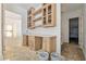 Hallway featuring built-in cabinets and a stylish countertop, combining functionality with elegant design elements at 141 N. Trace, Alpharetta, GA 30009