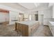 Elegant kitchen island with marble countertops, ready for gourmet cooking and entertaining guests at 141 N. Trace, Alpharetta, GA 30009