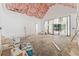 Open living room with high ceilings and large windows, perfect for entertaining and relaxation at 141 N. Trace, Alpharetta, GA 30009