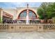 Striking movie theater exterior featuring a water fountain, prominent signage, and inviting ambiance at 141 N. Trace, Alpharetta, GA 30009