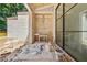 Outdoor kitchen with open-air brick grill, a great option for outdoor cooking and entertaining at 141 N. Trace, Alpharetta, GA 30009