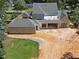 Rear view of new construction shows covered patio and nice yard at 141 N. Trace, Alpharetta, GA 30009