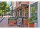 Outdoor seating at Academy Street Bar on a tree-lined street at 141 N. Trace, Alpharetta, GA 30009
