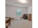 Cozy bedroom providing a serene ambiance with a large window and plenty of space for furniture at 2210 Benidorm Ct, South Fulton, GA 30349