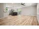 Large open plan living area featuring the kitchen, living room, and dining area, bright and open space at 276 Indian Creek Dr, Powder Springs, GA 30127