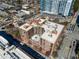 Aerial shot showcasing a brick building surrounded by city streets and neighborhood at 115 W Peachtree Nw Pl # 602, Atlanta, GA 30313