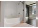 Bathroom view from tub area to bedroom that features a large window at 115 W Peachtree Nw Pl # 602, Atlanta, GA 30313