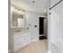 Neutral bathroom featuring a bathtub, tile floors, white vanity and walls at 115 W Peachtree Nw Pl # 602, Atlanta, GA 30313