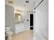 Neutral bathroom featuring a bathtub, tile floors, white vanity and walls at 115 W Peachtree Nw Pl # 602, Atlanta, GA 30313
