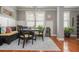 Bright dining room with stylish lighting fixture, bench seating, and modern decor at 2075 Old Georgian Nw Ter, Atlanta, GA 30318