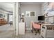 Cozy home office with a desk, chair, and natural light, creating a productive and comfortable workspace at 2075 Old Georgian Nw Ter, Atlanta, GA 30318
