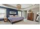 A spacious main bedroom offers natural light, refined decor and comfortable furniture at 2075 Old Georgian Nw Ter, Atlanta, GA 30318