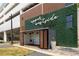 Welcoming Upper Westside community space featuring a modern container design and green wall at 2075 Old Georgian Nw Ter, Atlanta, GA 30318