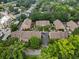 Aerial view of the community featuring well-maintained townhomes and lush green landscaping at 2584 Oglethorpe Ne Cir, Brookhaven, GA 30319