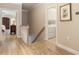 Upstairs hallway leading to laundry room and bedroom at 2584 Oglethorpe Ne Cir, Brookhaven, GA 30319