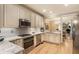 Bright, spacious kitchen with modern appliances and granite countertops; view of adjacent dining area at 2584 Oglethorpe Ne Cir, Brookhaven, GA 30319