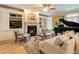 Elegant living room with a fireplace, built-in cabinets, and a sophisticated grand piano at 2584 Oglethorpe Ne Cir, Brookhaven, GA 30319