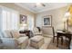 Cozy sitting room with shuttered windows, comfortable seating, and warm, neutral decor at 2584 Oglethorpe Ne Cir, Brookhaven, GA 30319