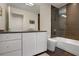 Contemporary bathroom with sleek vanity, and a shower/tub combination with glass enclosure at 3325 Piedmont Ne Rd # 2501, Atlanta, GA 30305