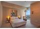 Cozy bedroom with modern decor, soft lighting, and a large window with a view at 3325 Piedmont Ne Rd # 2501, Atlanta, GA 30305