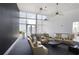 Well-lit game room with a pool table, comfortable seating, and large windows overlooking the city at 3325 Piedmont Ne Rd # 2501, Atlanta, GA 30305